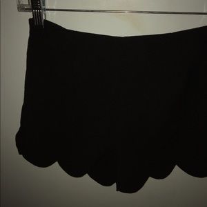 scalloped black shorts
